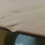 White Marble Gouge On Table Edge