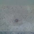 White Mosaic Shower Floor After Restoration