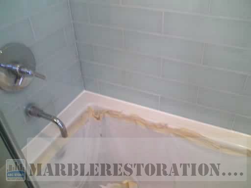 New Caulk Between Tub and Glass Tiles