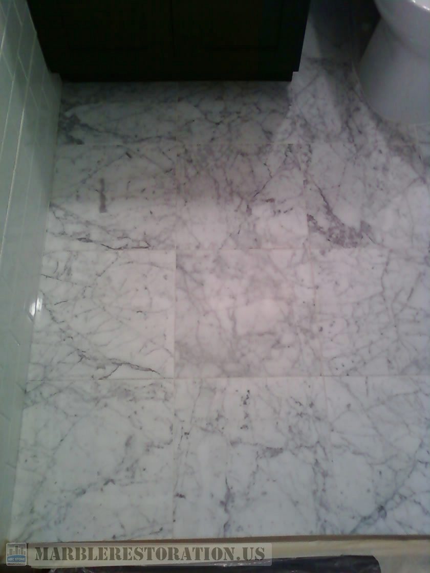 Carrara Bathroom Floor. Before Restoration