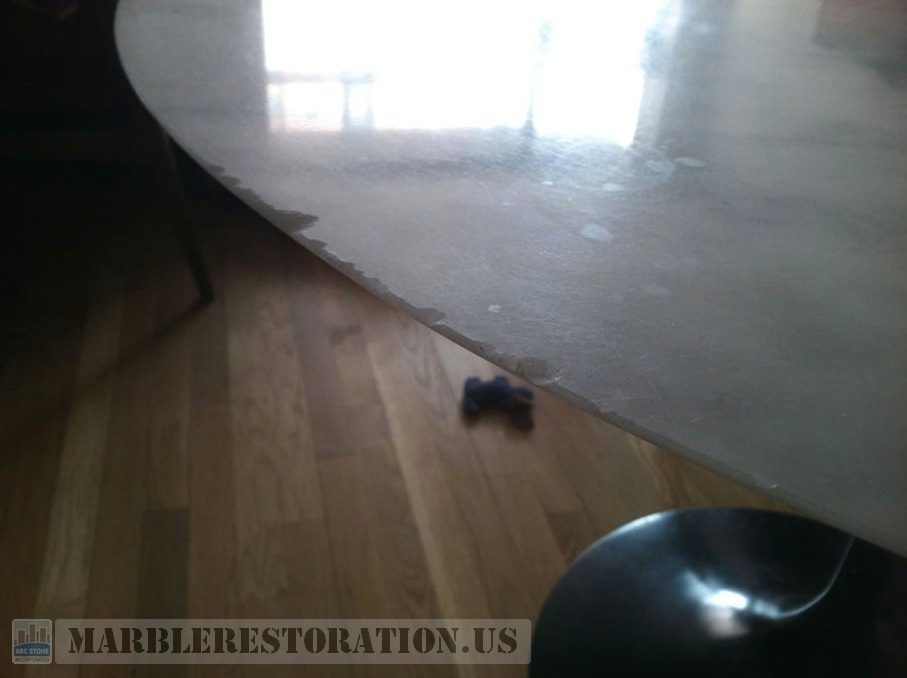 Chips on marble table. Repair