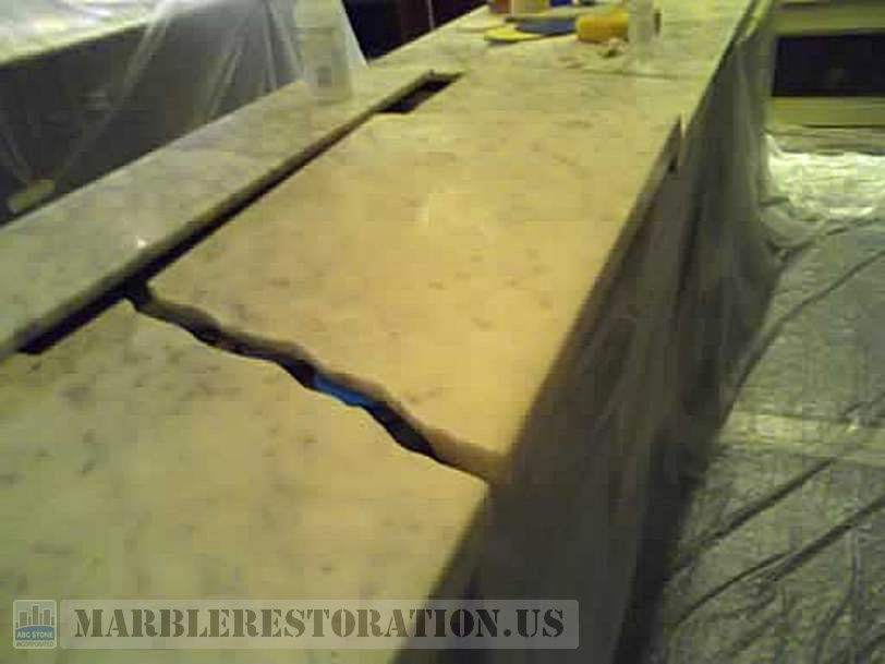 Dislodged Marble Countertrop in Retail Store