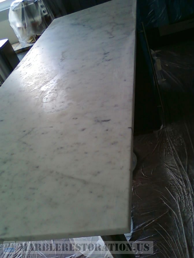 Splotchy Blots And Ring Marks White Kitchen Island