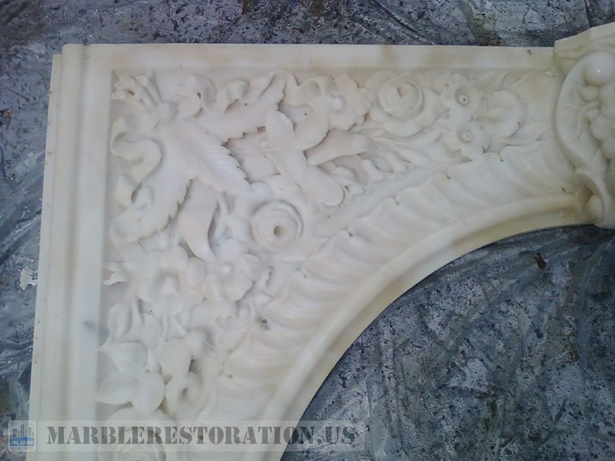 Carved Flowers in Fireplace Panel