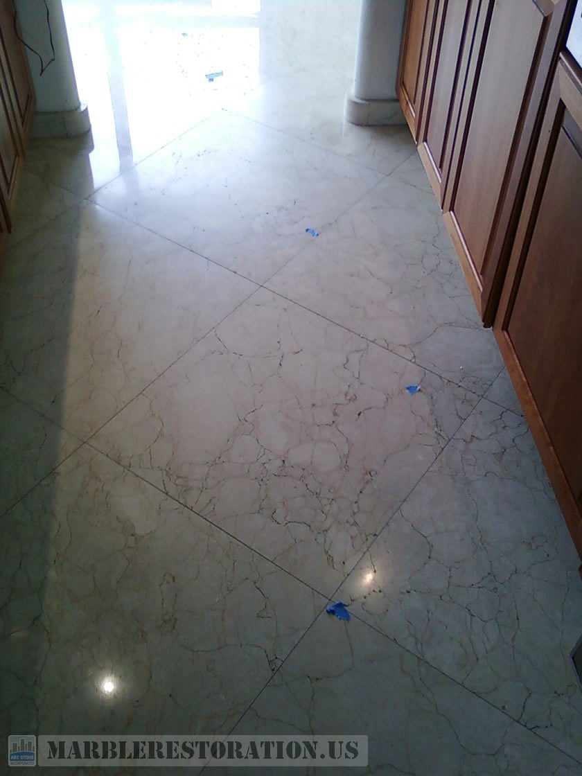 Deterioration on Kitchen Worn Floor