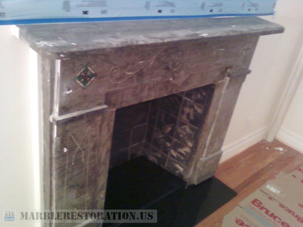 Dark Marble Fireplace Restoration