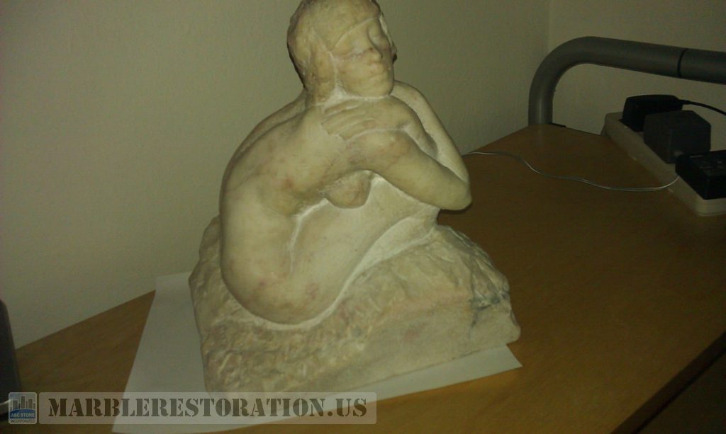 Perfectly Blended Crack on Antique Statue Basis. After Repair