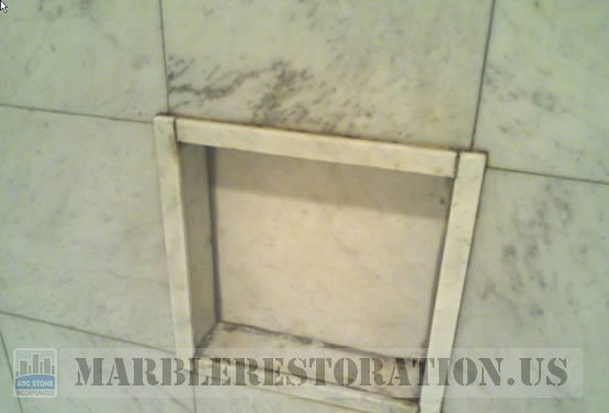 Built-in Shower Shelf. Yellowing