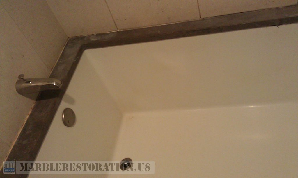 Stained Brown Limestone Bathtub Top