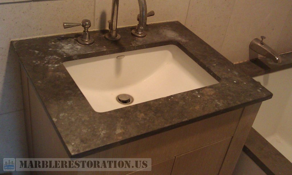 Splotchy Stains on Brown Marble Sink Top