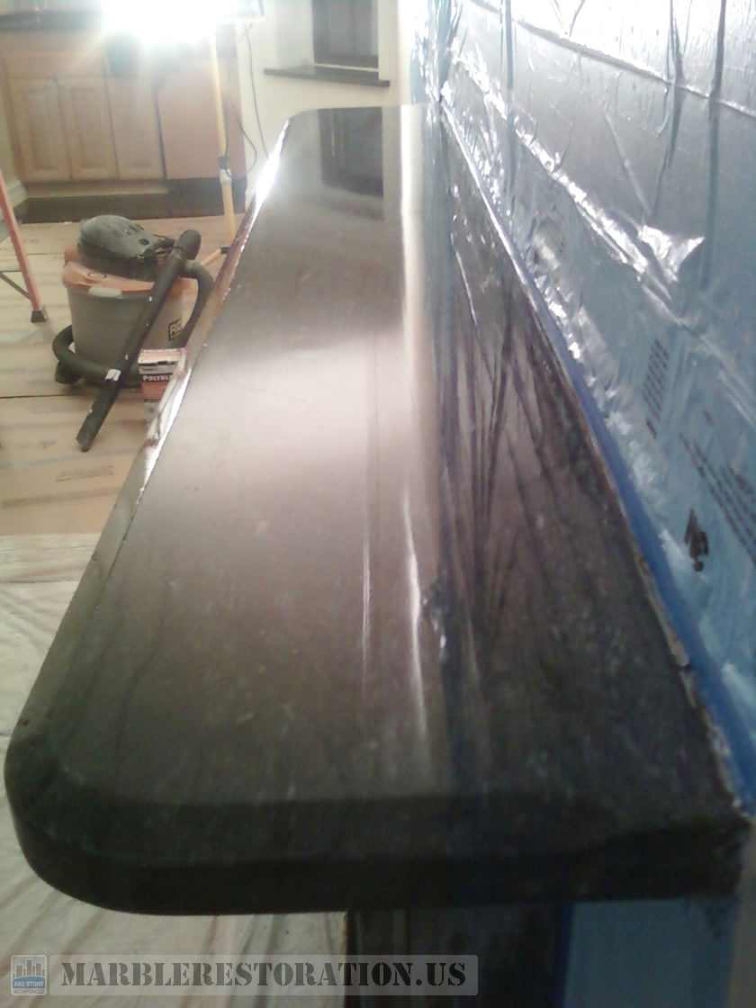 Beveled Top Slab on Fireplace. Polishing and Sealing