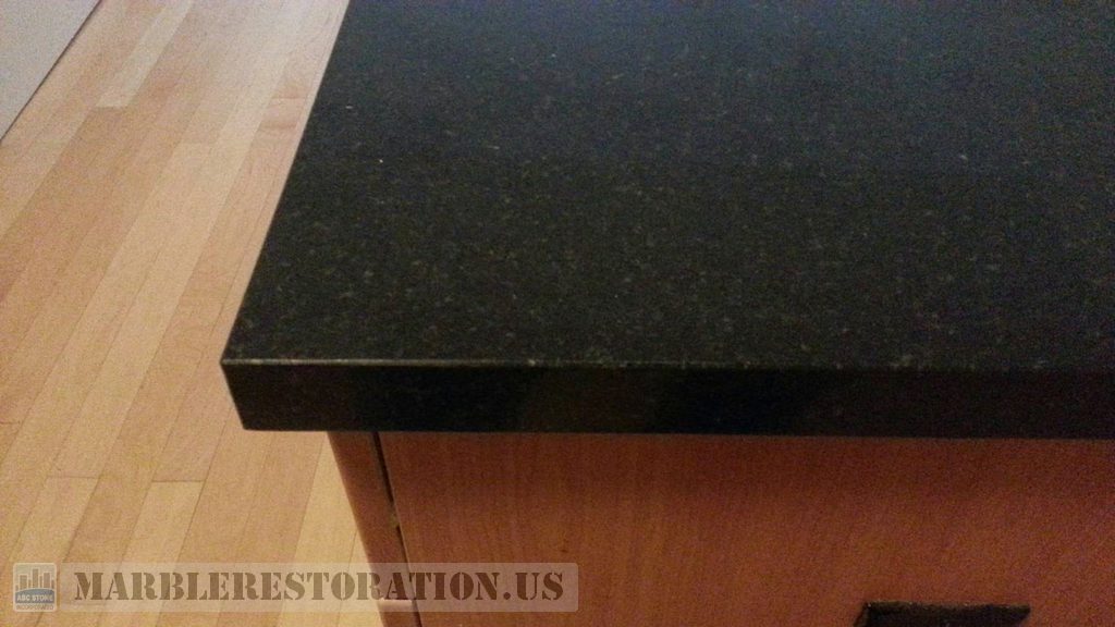Black Granite With Gray Crystals Chip after Repair