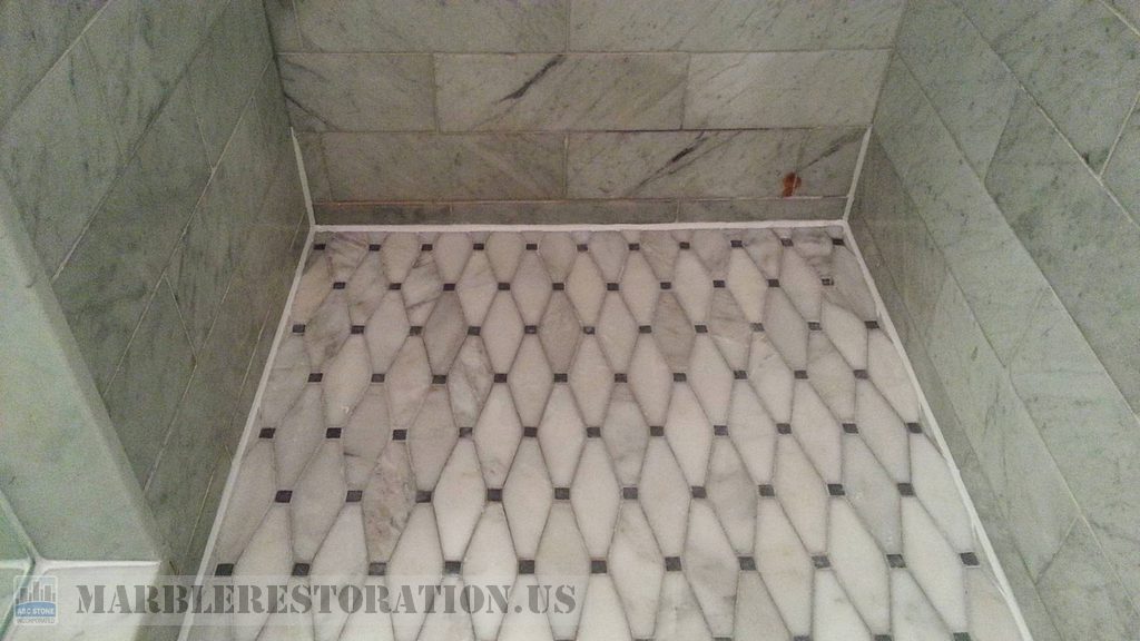 Shower Floor with White Caulk on Perimeter