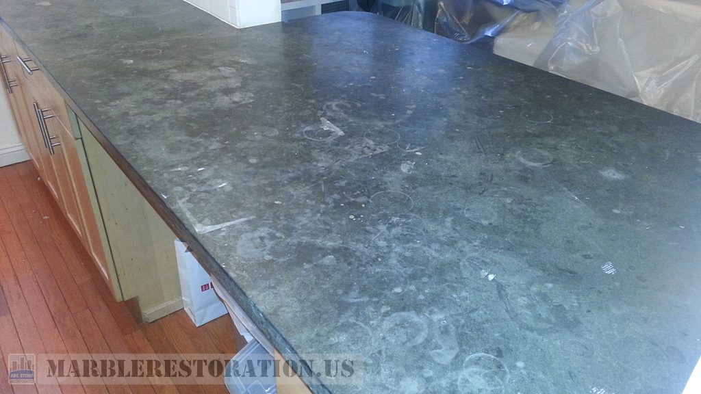 Severely Splotched and Etched Limestone Countertop Scouring