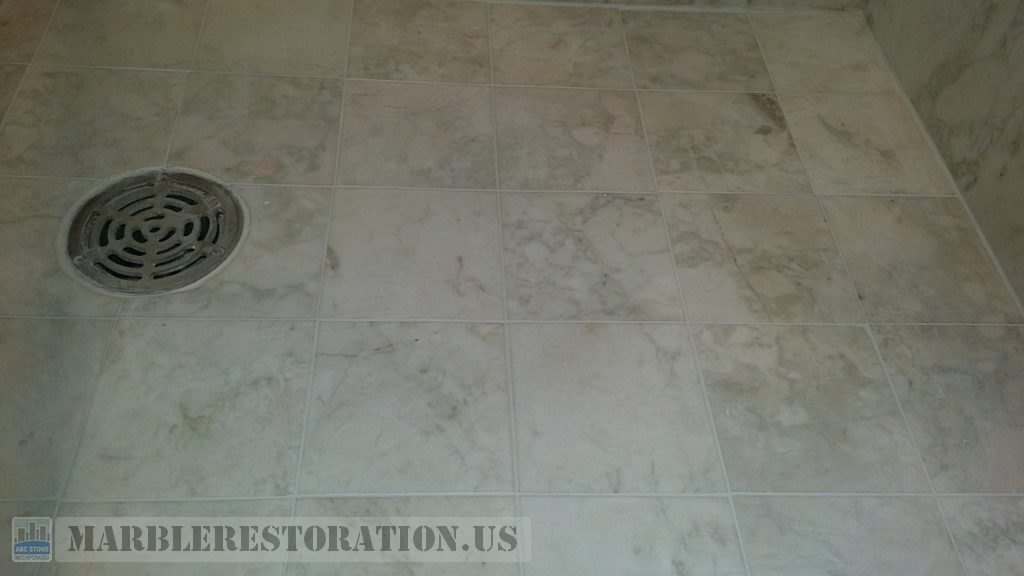 Shower Floor Buildup Removed And Regrouted