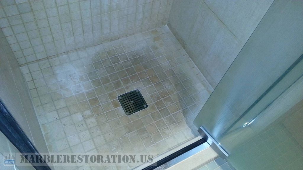 Stained Limestone Shower Mosaic Floor